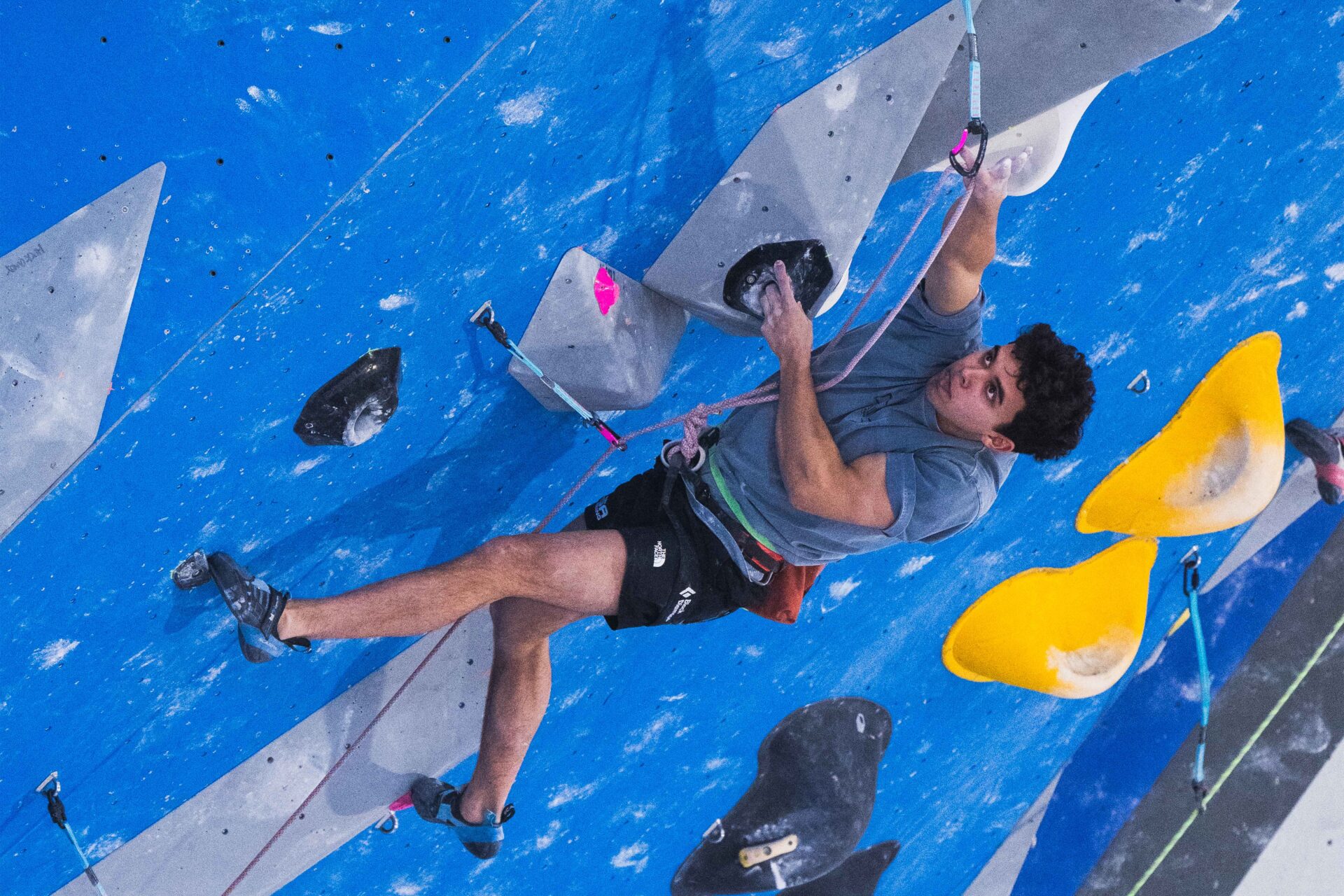 A climber climbing on a wall